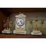 A late 19th century marble and gilt brass clock garniture, the clock 28.5cm high.