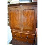 A 19th century mahogany linen press, enclosing three original trays, 117.5cm wide.