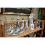 Five Lladro figures, largest 35cm high; together with two other similar figures; and a pair of