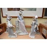 Five Lladro figures, largest 38cm high.