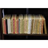 A collection of thirty Beatrix Potter books.