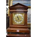 An Edwardian oak architectural mantel clock, 41.5cm high.