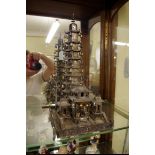 A Chinese metal pagoda temple, 34cm high.