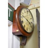 A mahogany circular wall clock, with 12in dial and fusee movement, with key and pendulum.