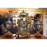 A late 19th century gilt metal and Sevres style porcelain clock garniture, the clock 39.5cm high,