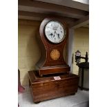 An Edwardian mahogany and inlaid balloon clock, 31cm high; together with a Regency mahogany