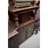 An old reproduction small oak court cupboard, 68.5cm wide; together with a similar bureau on