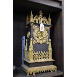 A 19th century bronze and gilt bronze Gothic architectural mantel clock, by Guyerdet Aine, No.