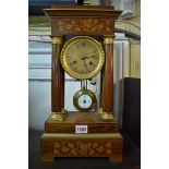 A 19th century rosewood and inlaid portico clock, 41.5cm high, with pendulum.