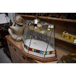 A leaded and stained glass terrarium, 70cm wide.