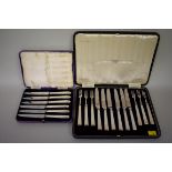 A cased set of six silver handled fruit knives and forks, by Goldsmiths & Silversmiths Ltd,