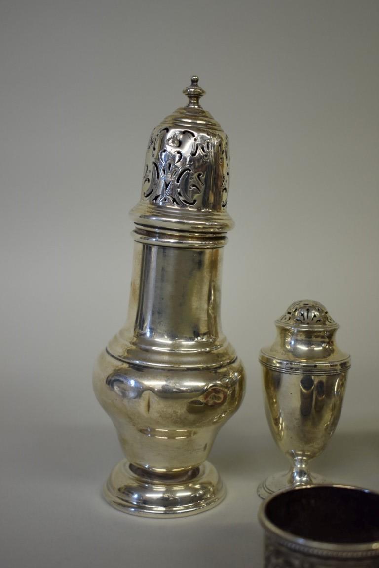 A selection of silver items, to include: a caster; condiments; and napkin holders, 362g weighable. - Image 2 of 4