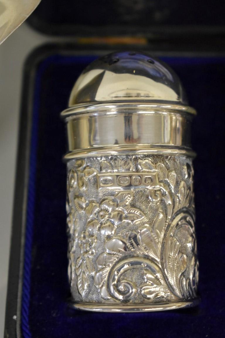 A cased Victorian embossed silver cruet set, by C T Burrows & Sons, Birmingham 1899; together with a - Image 3 of 3