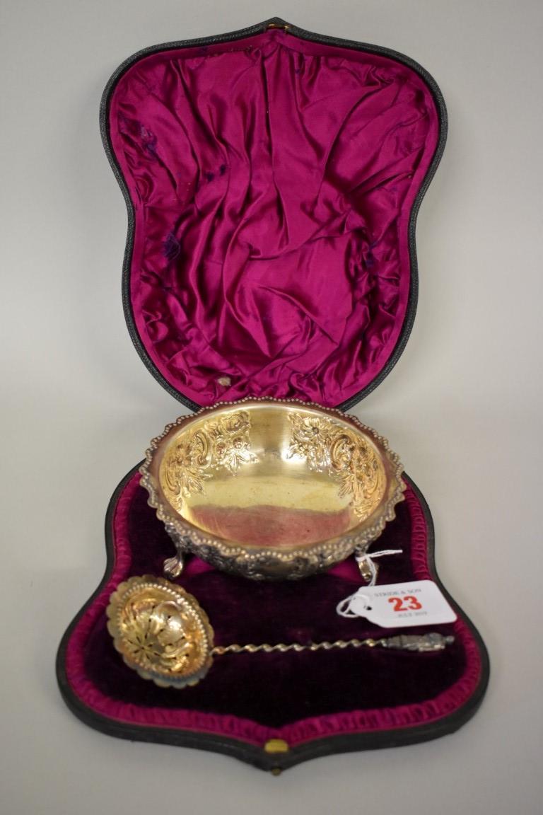 A cased Victorian silver gilt embossed sugar bowl and sifter, by William Hutton & Sons, London 1891,