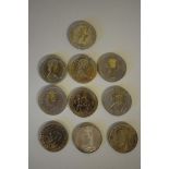 Coins: ten British crowns, to include three silver examples; Victoria 1890; George V 1935; and