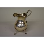 A silver baluster cream jug, by George Nathan & Ridley Hayes, Chester 1901, 10cm high, 105.5g