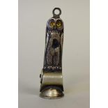 A base metal novelty owl cigar cutter, 4.5cm.