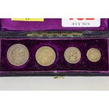 Coins: a cased Victoria maundy money set, three  dated 1897, the one penny dated 1847.