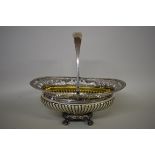 An impressive Russian or Continental silver oval swing handled fruit basket, initialled I I S,