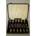A cased set of twelve teaspoons, by Barker Brothers Silver Ltd, Birmingham 1934, 157g.