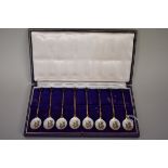 A cased set of eight silver and enamel spoons, by Cohen and Charles, Birmingham 1966, having