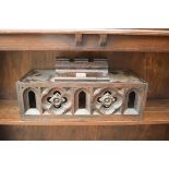 A Gothic style carved and pierced oak casket and cover, width including handles 46cm.