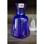 An Erik Hoglund for Kosta Boda blue glass vase, etched 'H938/215' to base, 22cm high.