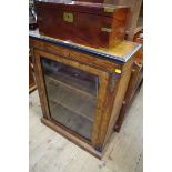 A late Victorian walnut and inlaid pier cabinet, 76cm wide.