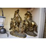After Coustou, a pair of brass or polished bronze Marly horse figure groups, 37.5cm high.