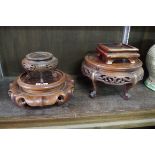Four Chinese wooden stands.