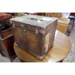 An interesting vintage canvas and leather bound square travelling trunk, by 'Army & Navy', with