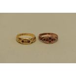 A gem set gold ring, hallmarked 18ct, 3.6g; and another, hallmarked 9ct, 2.5g.