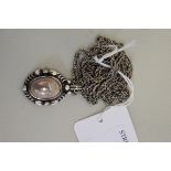 A Georg Jensen .925 'Heritage Pendant of the Year 1995' on unmarked chain, boxed.