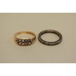 A Victorian gold ring set split pearls, hallmarked 15ct, Birmingham 1891, 2.2g total weight;