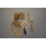 A small quantity of carved bone jewellery and other items.