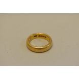 A gold wedding band, hallmarked 22ct, 8.4g.