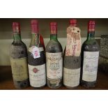 Five 75cl bottles of French red wine, comprising: a Chateau Rider-Chenu-Lafitte 1979; a Chateau de