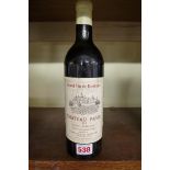 A 75cl bottle of Chateau Pavie 1961.