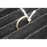 A gold wedding band, hallmarked 375, 2.3g.