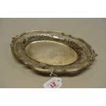 An Edwardian pierced silver oval dish, by Reid & Sons, London 1904, 29cm wide, 281.5g.