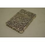 A late 19th century Indian Kutch region white metal embossed card case, 10 x 7cm.