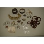 A small selection of silver and costume jewellery, to include silver & enamel brooches and a glass