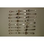 Ten silver condiment spoons; together with two others, 144g; and twelve coffee spoons.