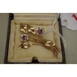 A pearl and amethyst floral spray gold brooch, by Fattorini, hallmarked 9ct, 4.6g total.