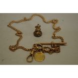 An unmarked yellow metal Albert chain, having a gold US Liberty 1/10 dollar coin attached, 21.8g;