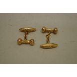 A pair of chased gold cufflinks, hallmarked 375, 3.9g.