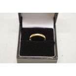 Two gold wedding bands, stamped 22ct, 7.9g.