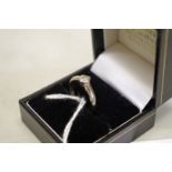 A princess cut rub over diamond solitaire white gold ring, hallmarked 750, 0.25ct.