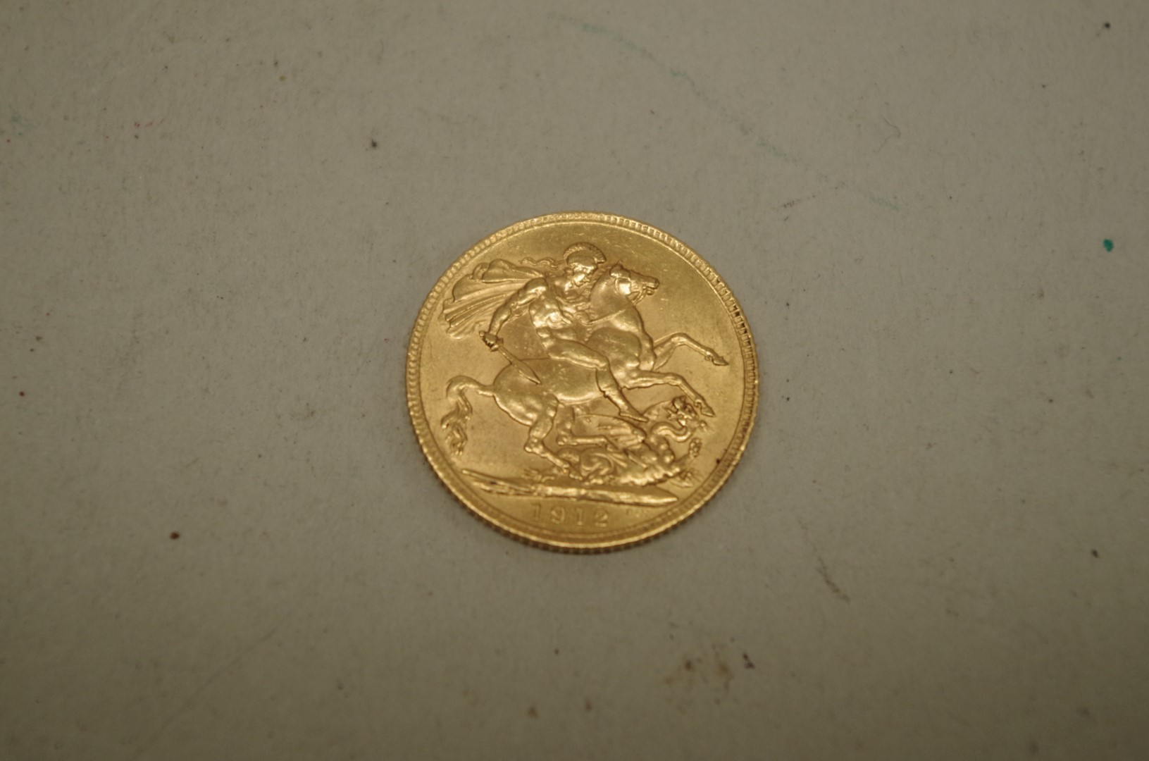 A George V 1912 gold sovereign. - Image 2 of 2