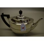 An Edwardian silver teapot, by William Hutton & Sons Ltd, London 1903, 602g all in.